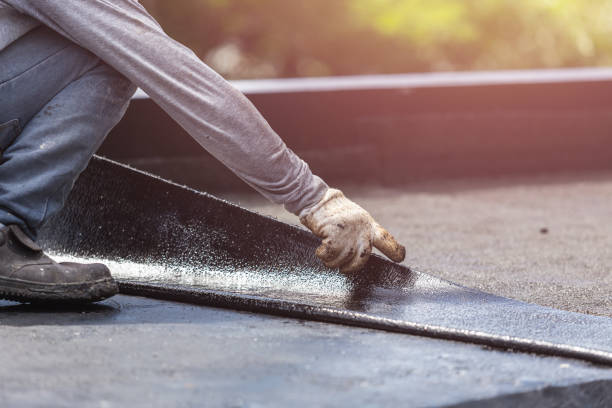 Professional Basement Waterproofing technician working in Newport, WA